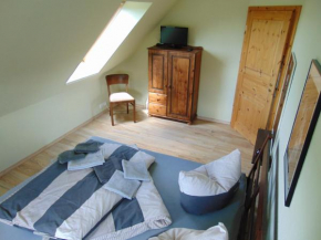Отель Ferienwohnung auf Rügen in Maltzien  Гарц